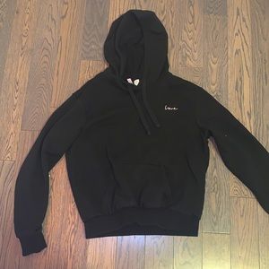 Black Hoodie with “Love” written on top left corner